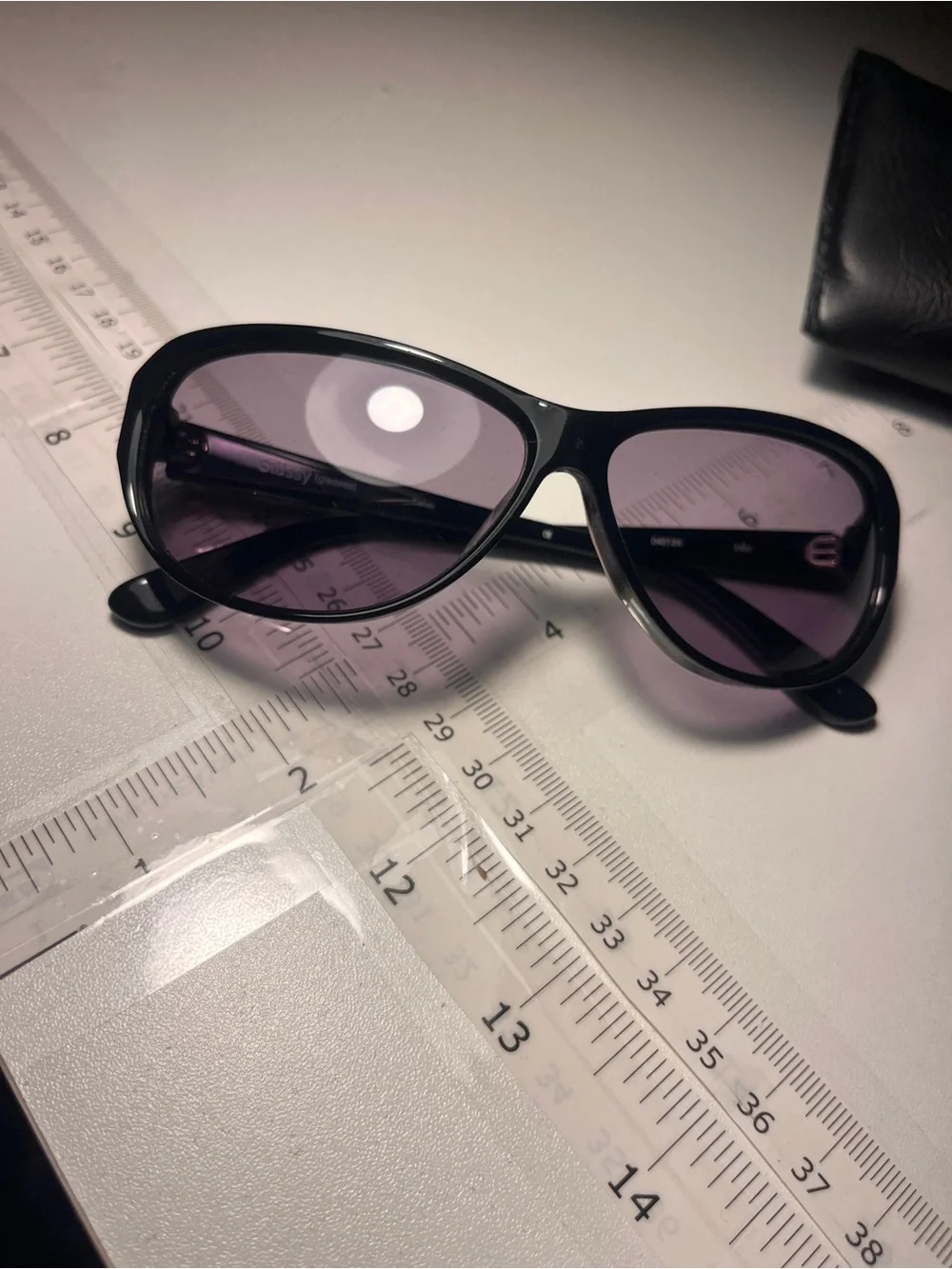 Stussy Black Frame Sunglasses with Purple Tinted Lenses